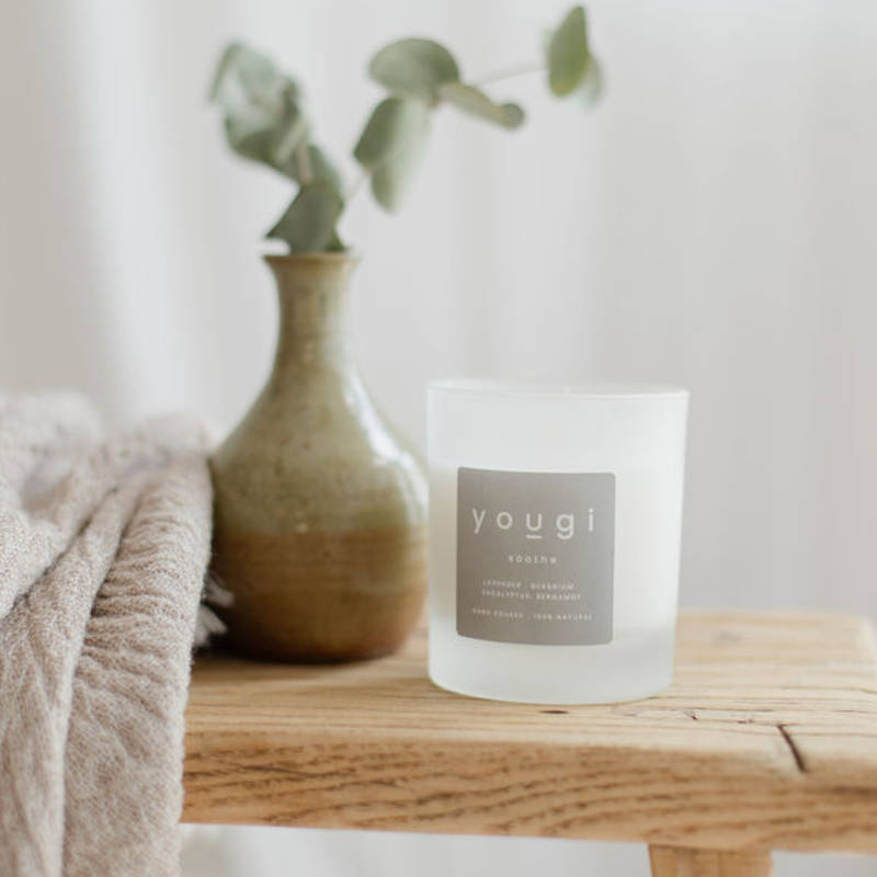 Yougi natural soy candles in amber glass.