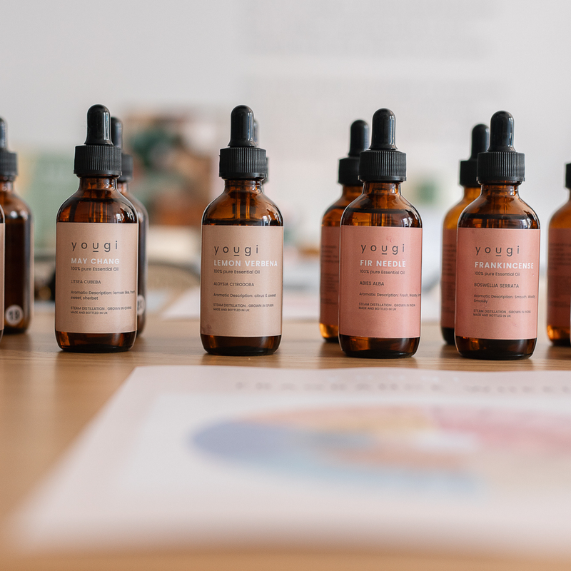 Essential Oils lined up on table 
