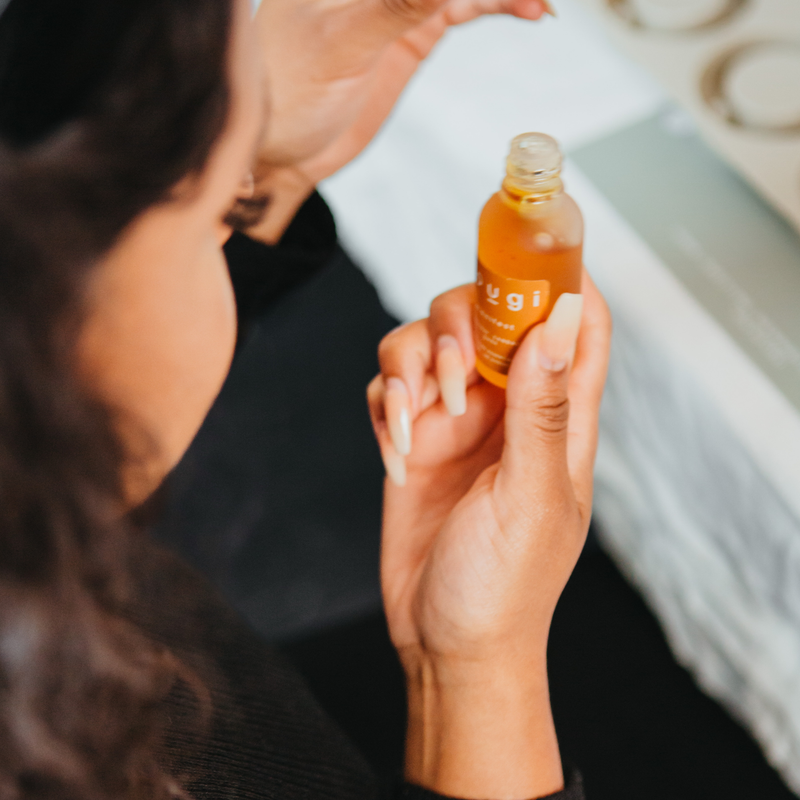 Essential oil bottles with botanicals, explained simply.
