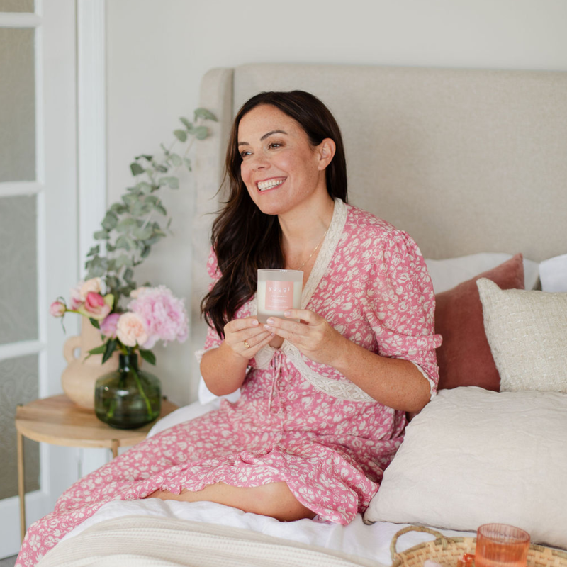 A quiet daily self-love ritual with a candle.