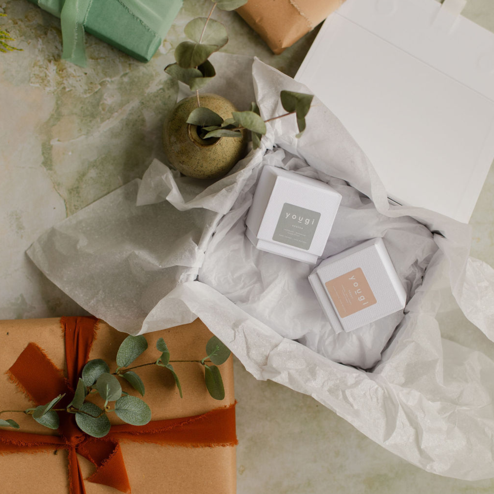 A wellness experience gift over a wrapped object.