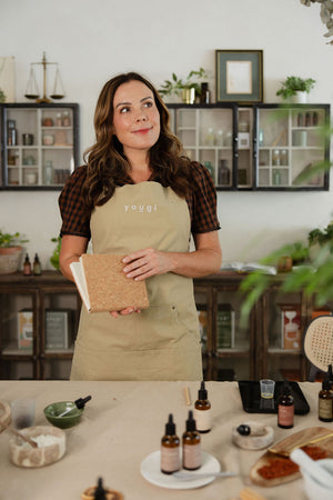 Emily in the workshop with the blending notebook