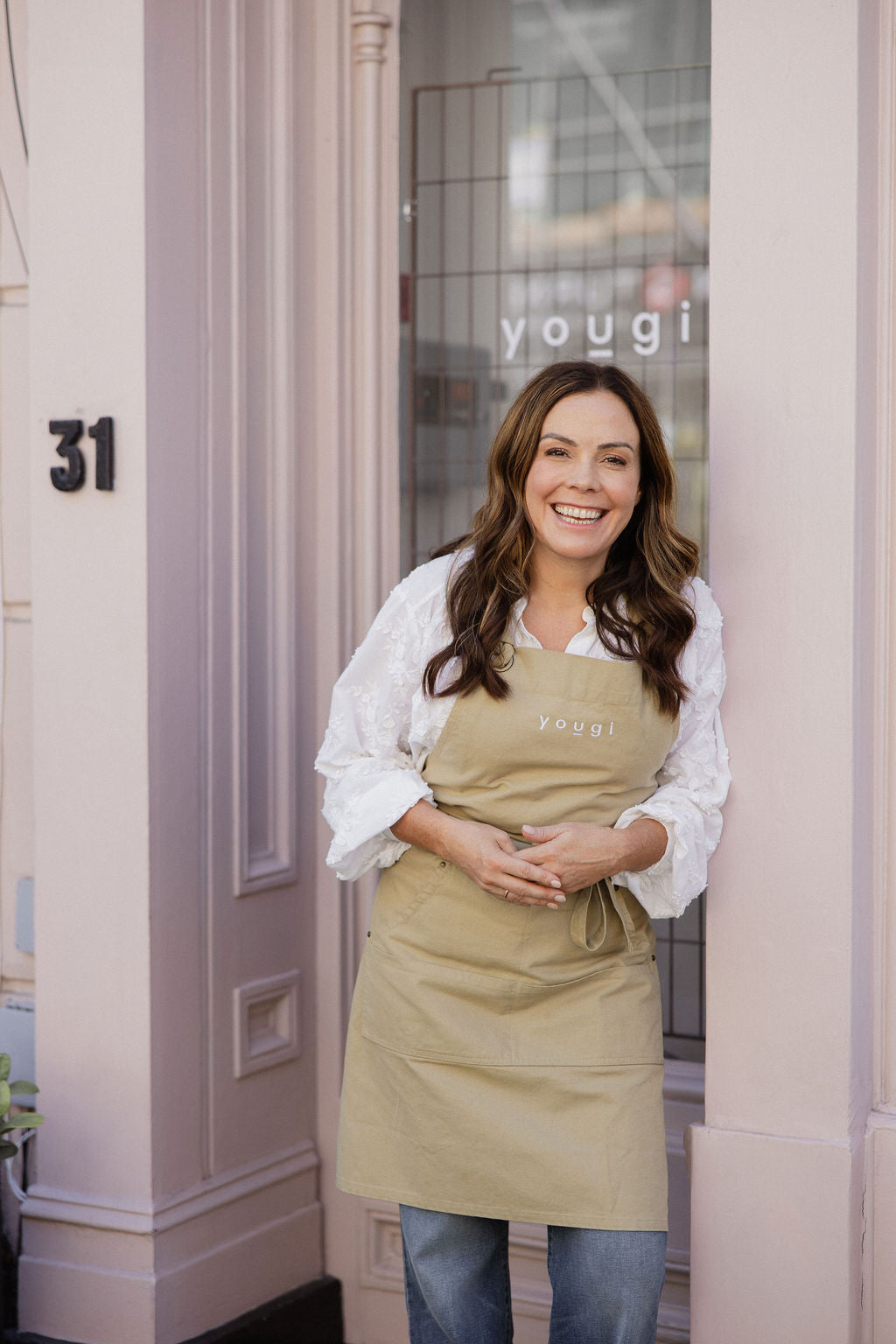 Emily Lynam in the doorway of the Yougi shop at 31 Connaught Street
