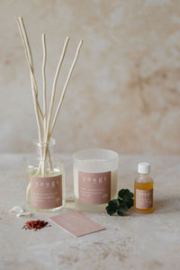 New Romantic candle, reed diffuser and pure essential oil together on the workshop bench
