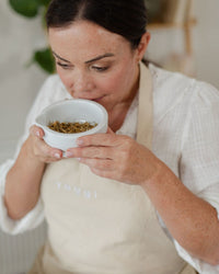 Smelling dried botanicals at the Yougi studio
