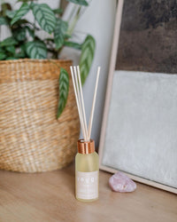 Happy reed diffuser on the sideboard at home