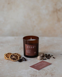 Hearth candle in amber glass, Yougi