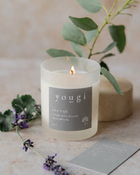 Soothe candle lit in frosted white glass, with eucalyptus and lavender